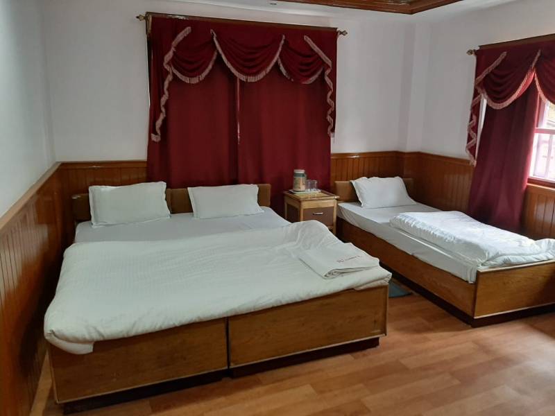 Triple bed deluxe room
